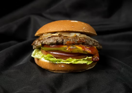 Alberta Classic - Our signature beef burger with fresh lettuce, tomato, onion, and our special sauce